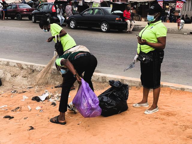 Volunteers sweeping